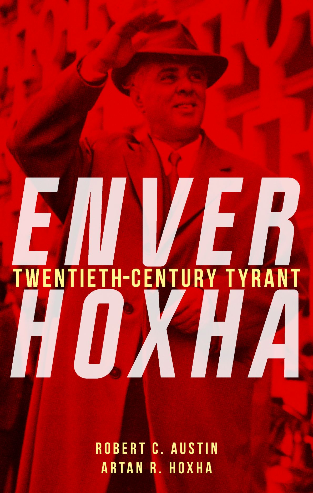 **Alt text:** Book cover of *Enver Hoxha: Twentieth-Century Tyrant* by Robert C. Austin and Artan R. Hoxha. The cover features a red-tinted historical photograph of Enver Hoxha, the communist leader of Albania, wearing a hat and overcoat and raising his hand in greeting. Large white capital letters spelling “ENVER HOXHA” dominate the centre of the cover, with the subtitle “Twentieth-Century Tyrant” in smaller yellow text across the middle. The authors’ names appear in yellow at the bottom. The overall design uses a stark red, white, and yellow colour scheme, creating a dramatic and authoritarian visual effect.